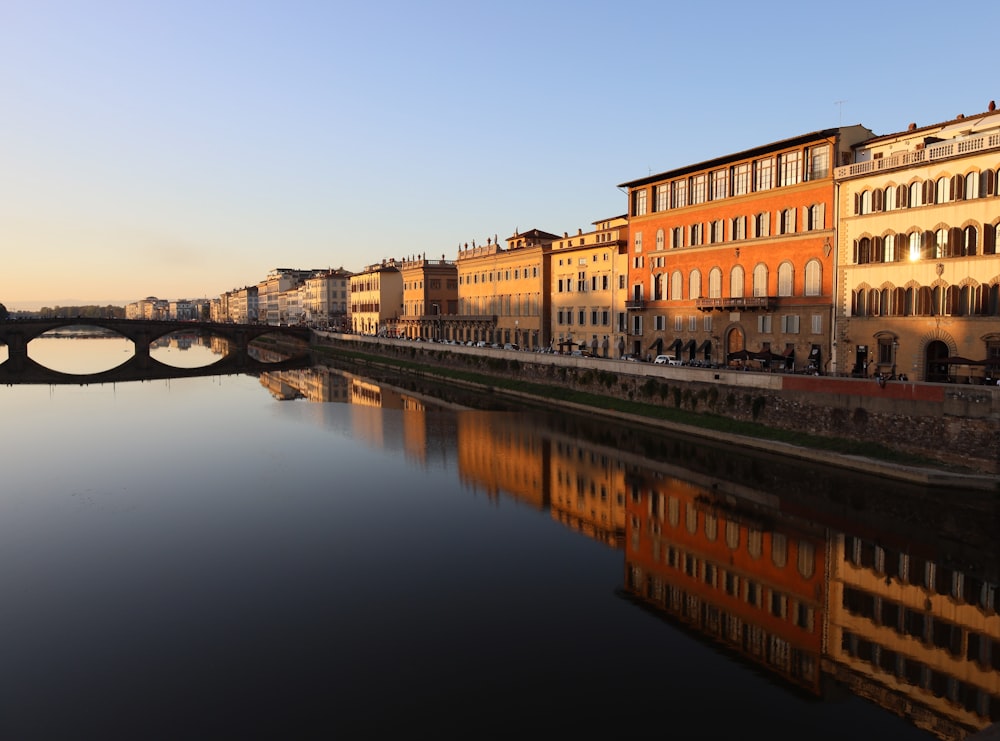 a body of water with buildings along it