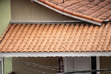 a roof with a metal bar