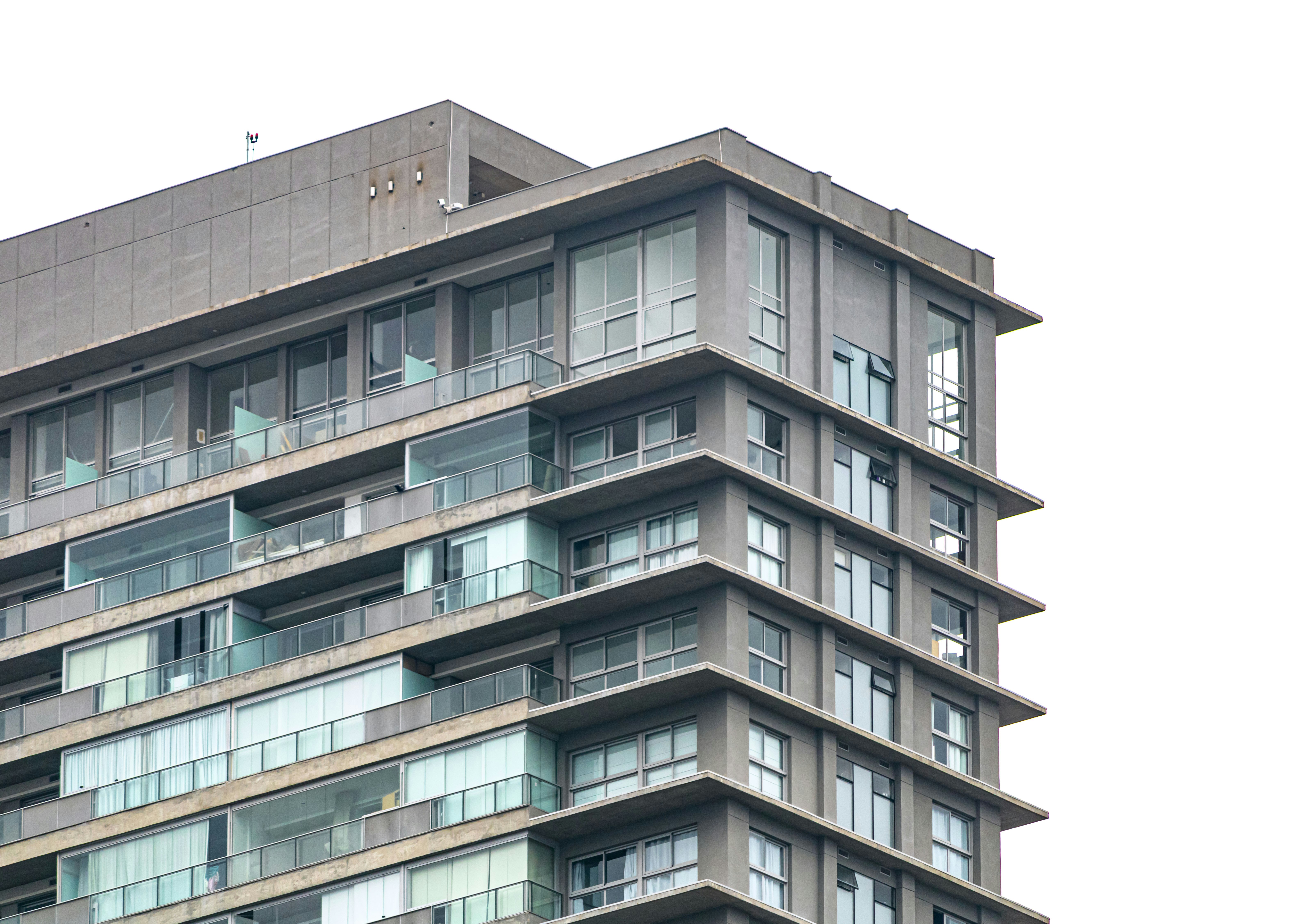 Modern Vancouver apartment exterior with smoke-free signage and clean architectural lines - smoke free apartments Vancouver WA