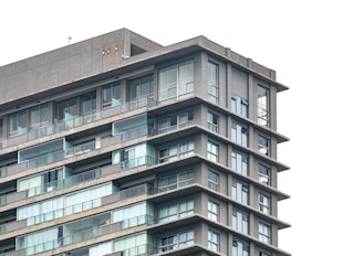 A sleek high-rise condo with floor-to-ceiling windows.