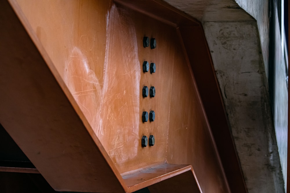 a wooden clock on a wall