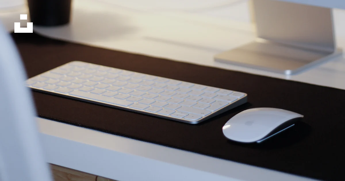 A computer monitor and keyboard photo – Free Furniture Image on Unsplash