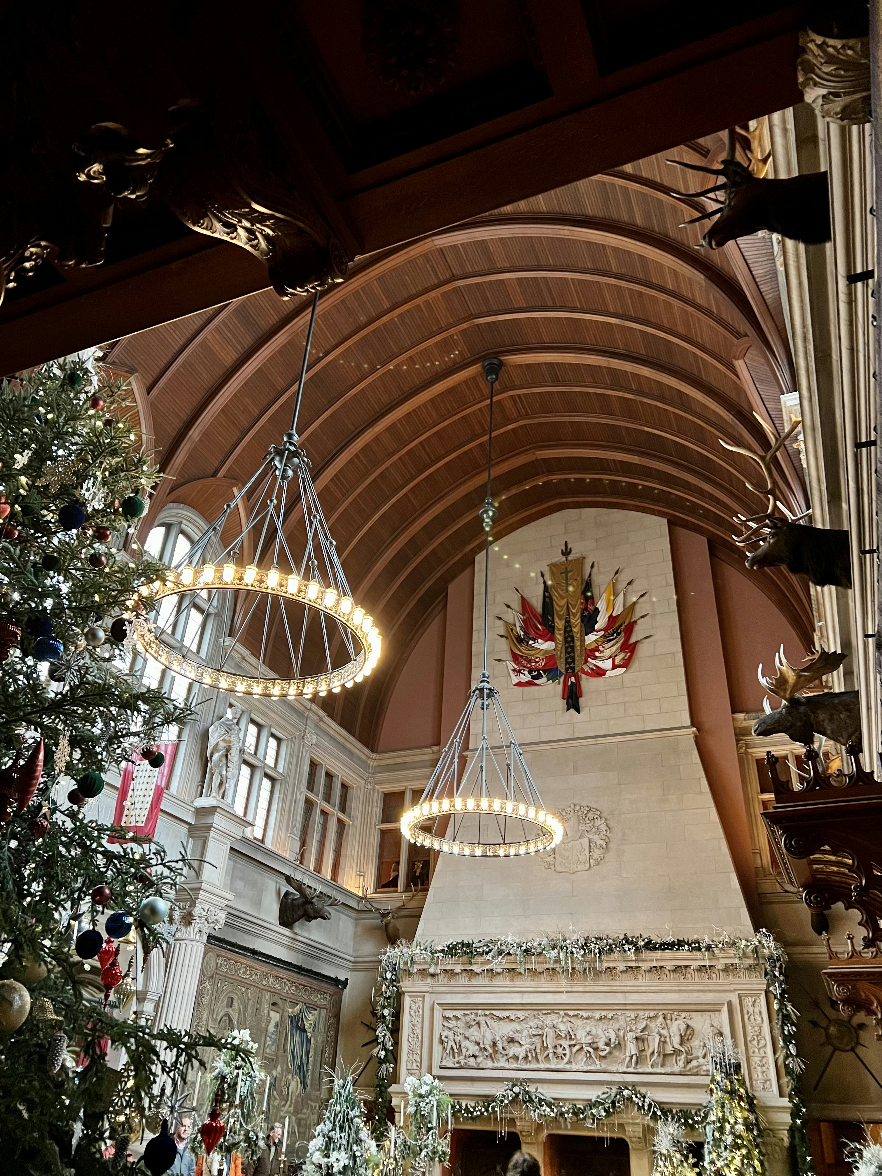 a large ornate building with a chandelier and decorations