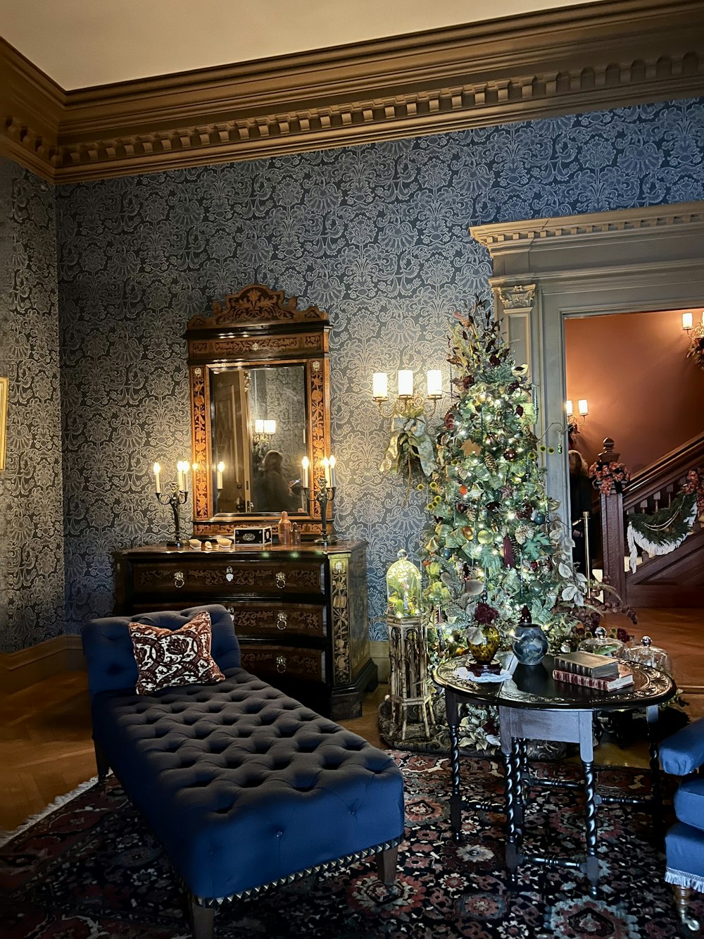 a living room with a christmas tree