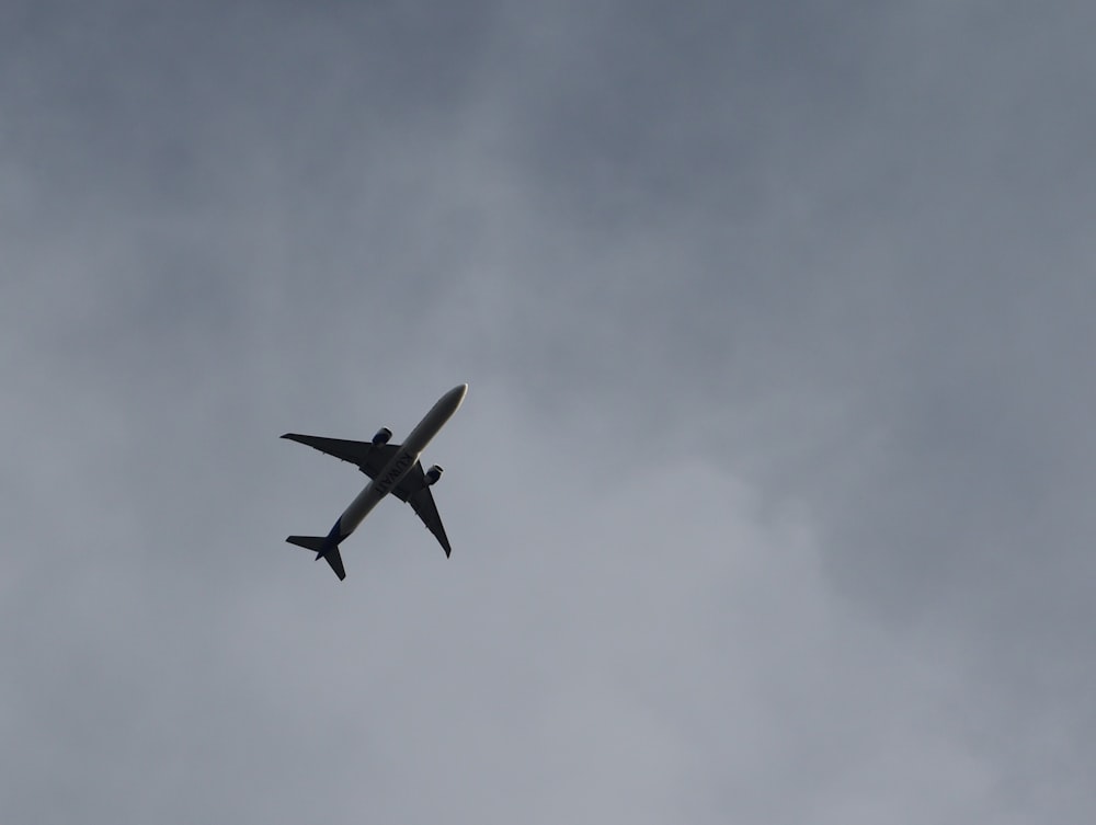 a plane flying in the sky