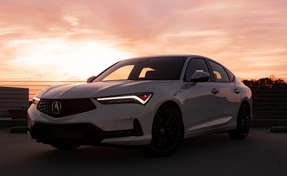 a white car parked in a parking lot