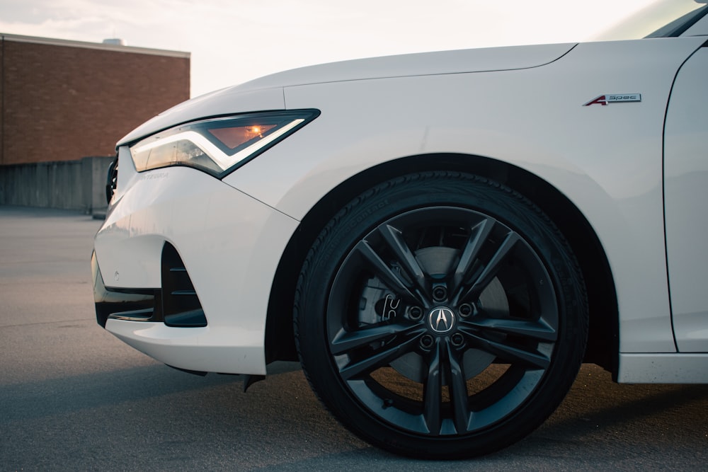 a white car with a black rim