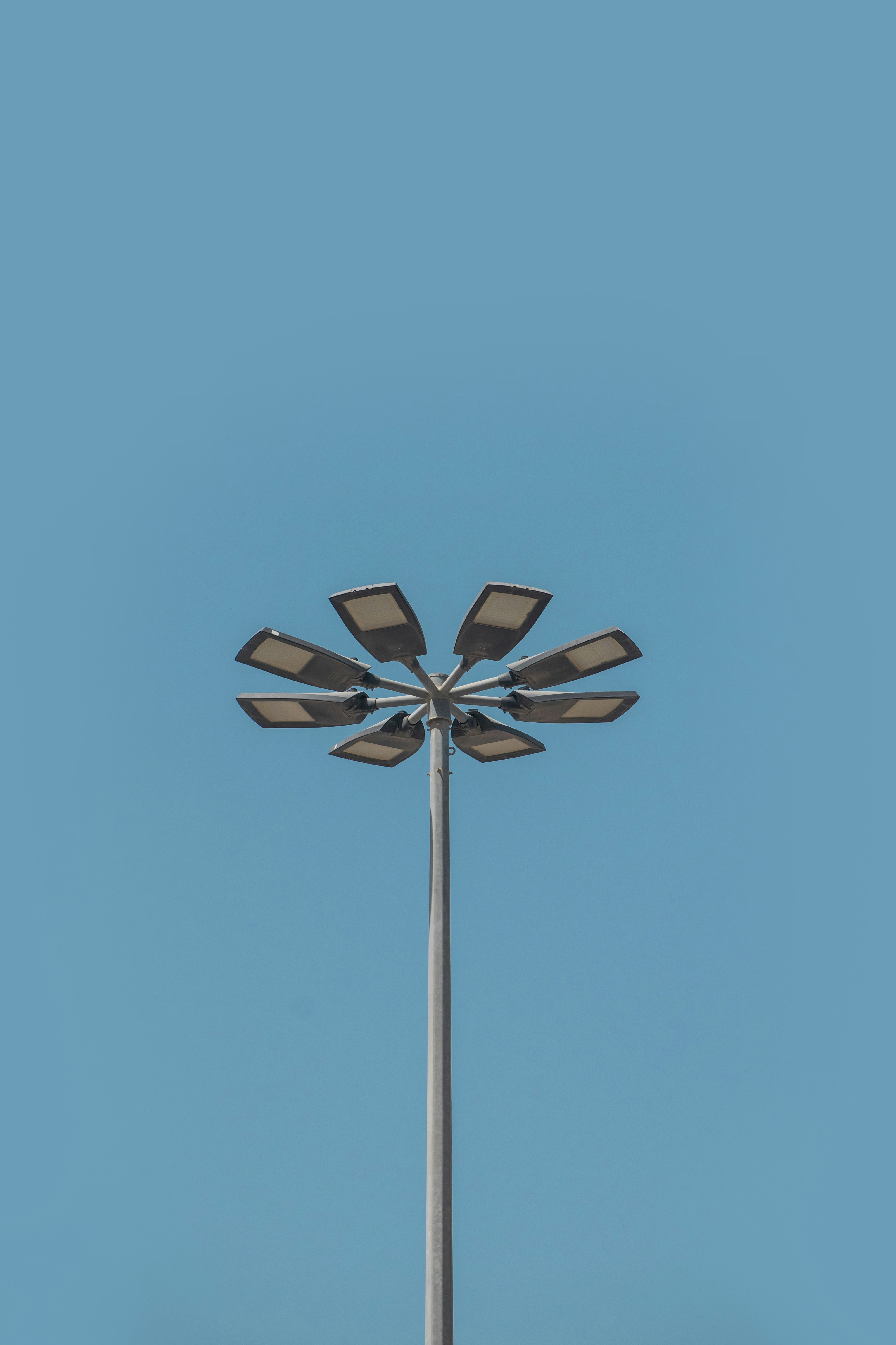 a wind turbine against a blue sky