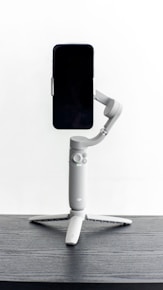 a silver and black vacuum cleaner