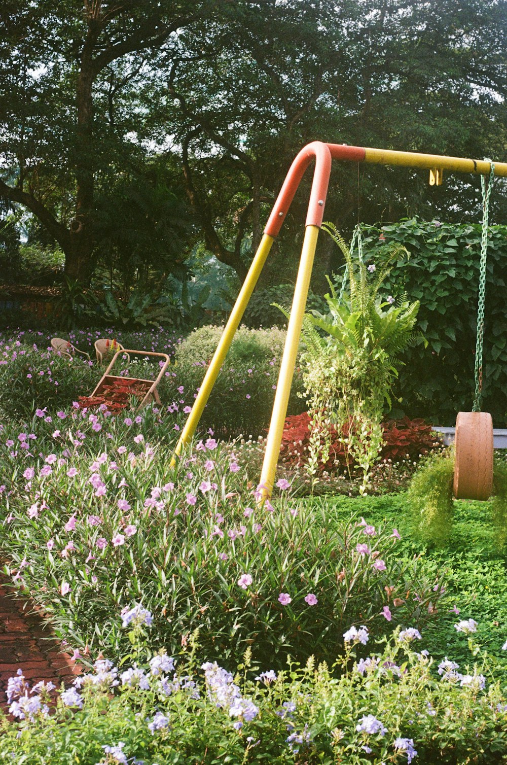 a swing set in a garden