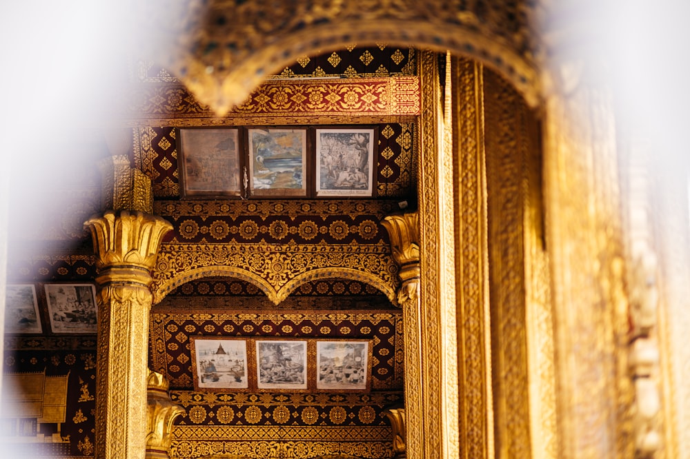 a gold and black ornate building