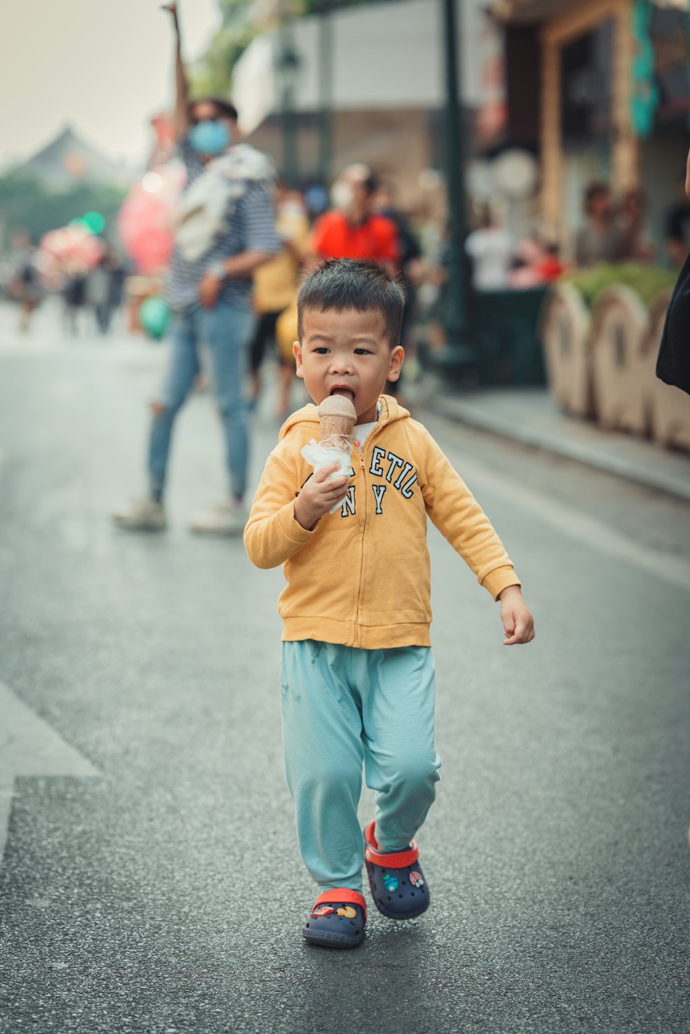 a boy eating ice cream