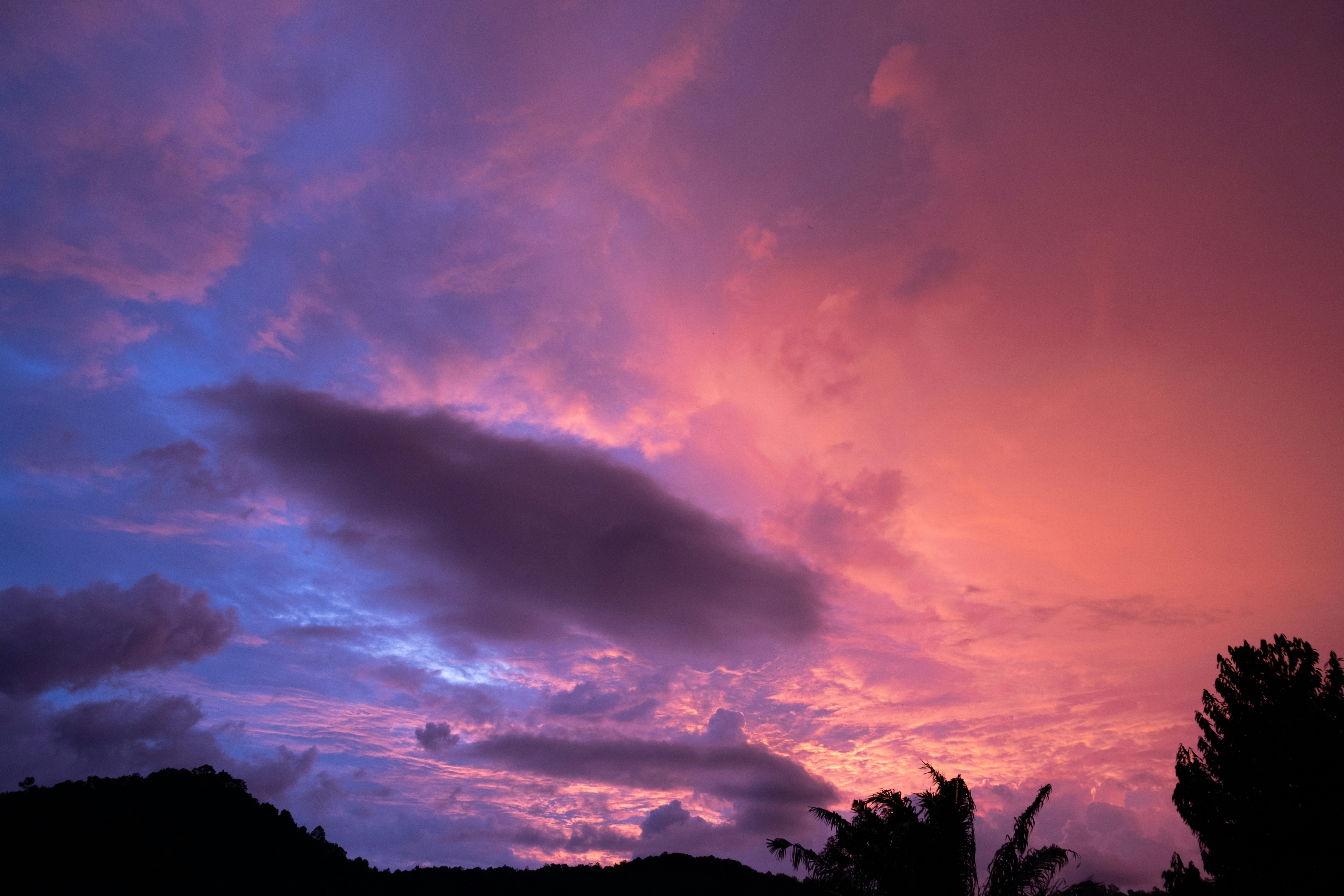 A pink and purple sky with clouds photo – Free Sunset Image on Unsplash