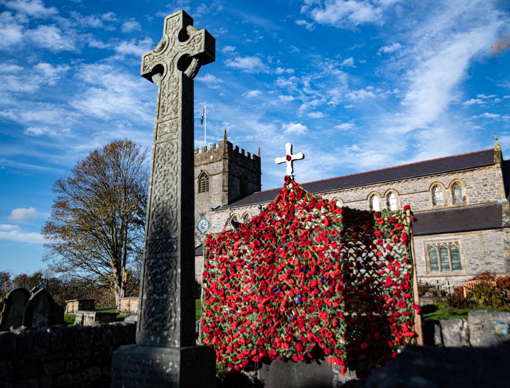 a large cross in front of a church