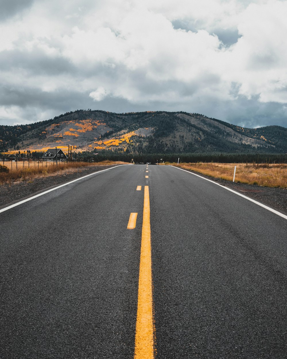 a road with a yellow line