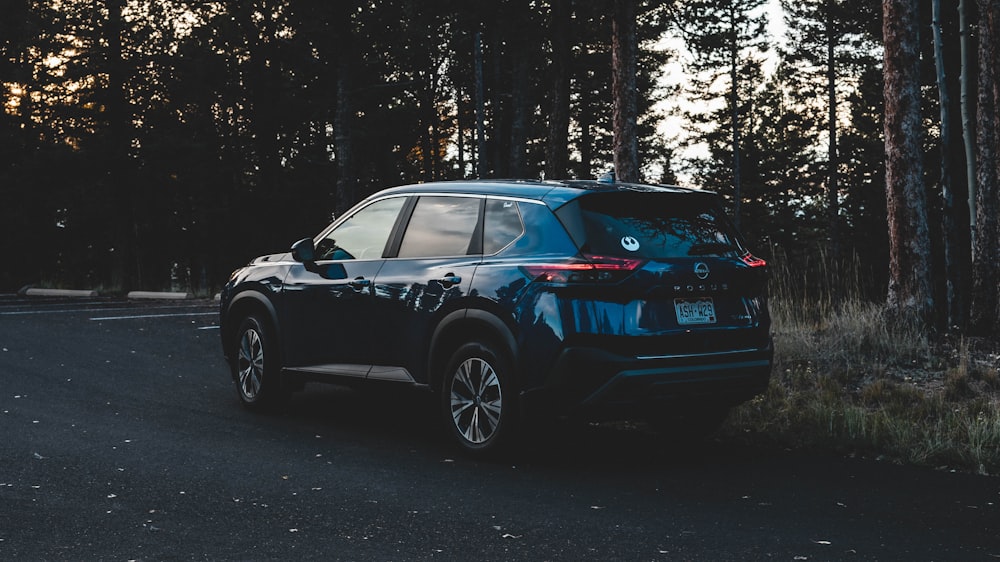 a car parked in a wooded area