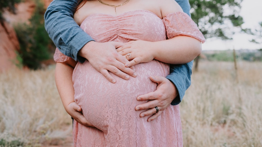 a person holding a baby