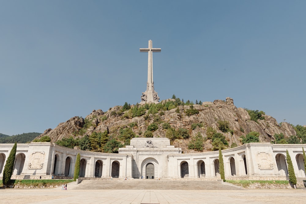 a white building with a cross on top of it