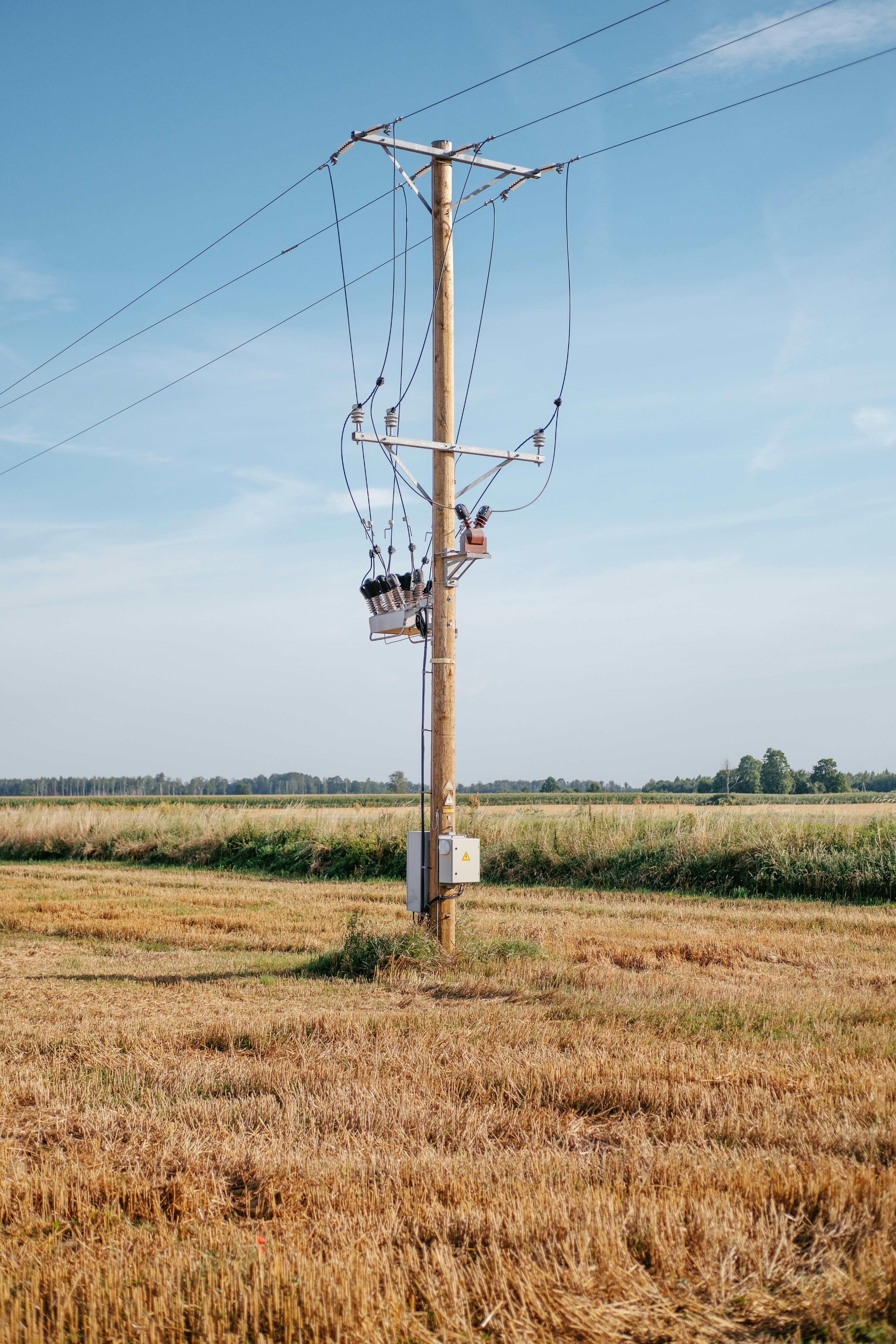 a telephone pole with wires