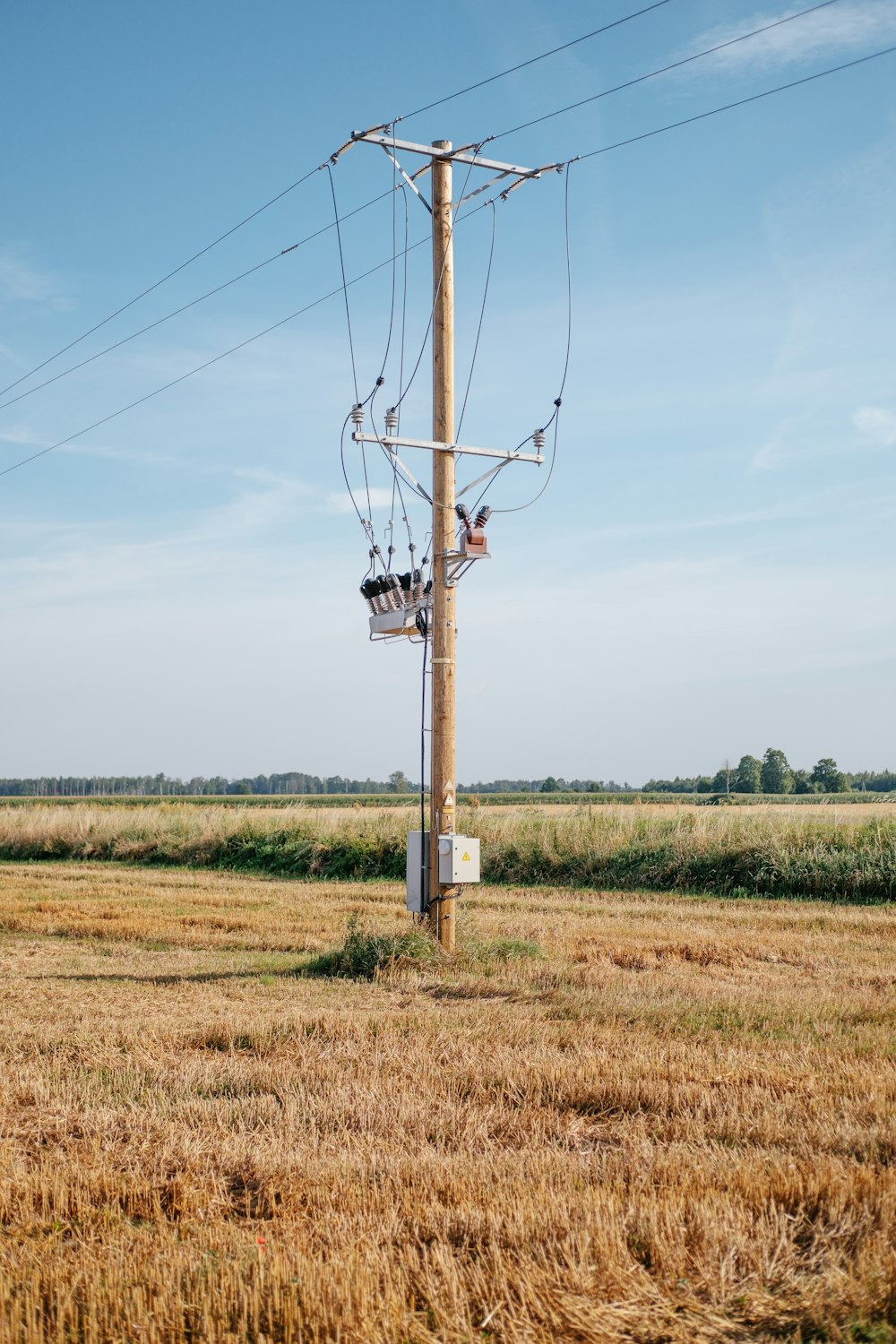 a telephone pole with wires