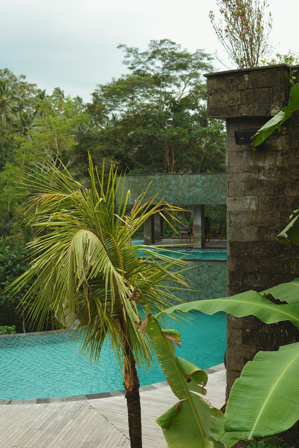 a pool with a building in the background