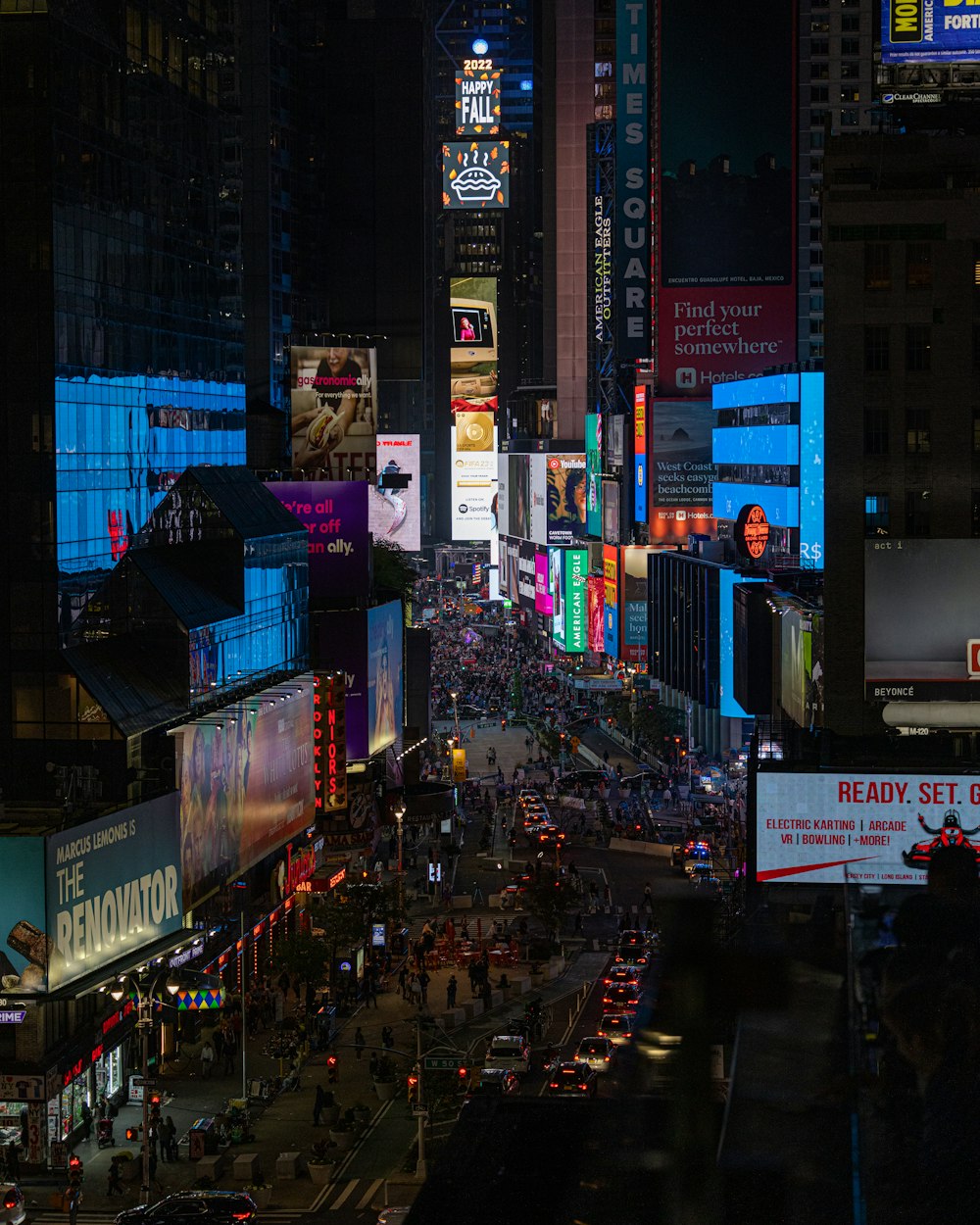 a busy city street at night