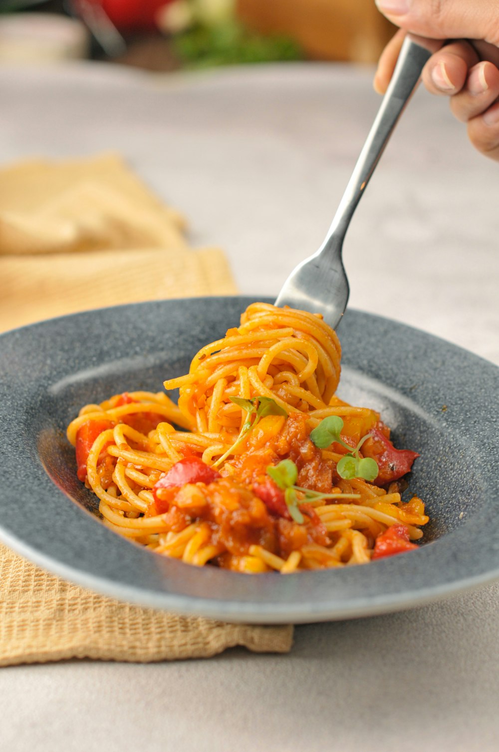 a person eating a bowl of food