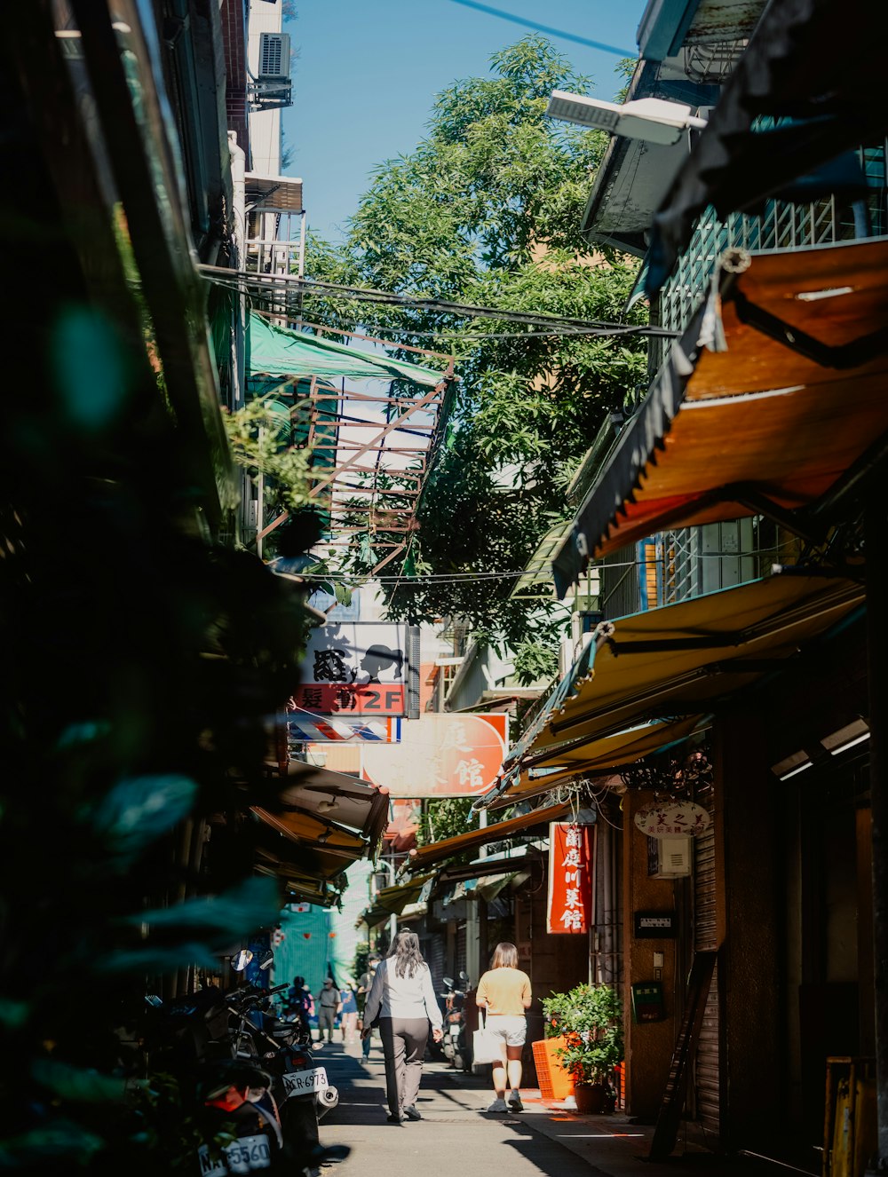 people walking down a street