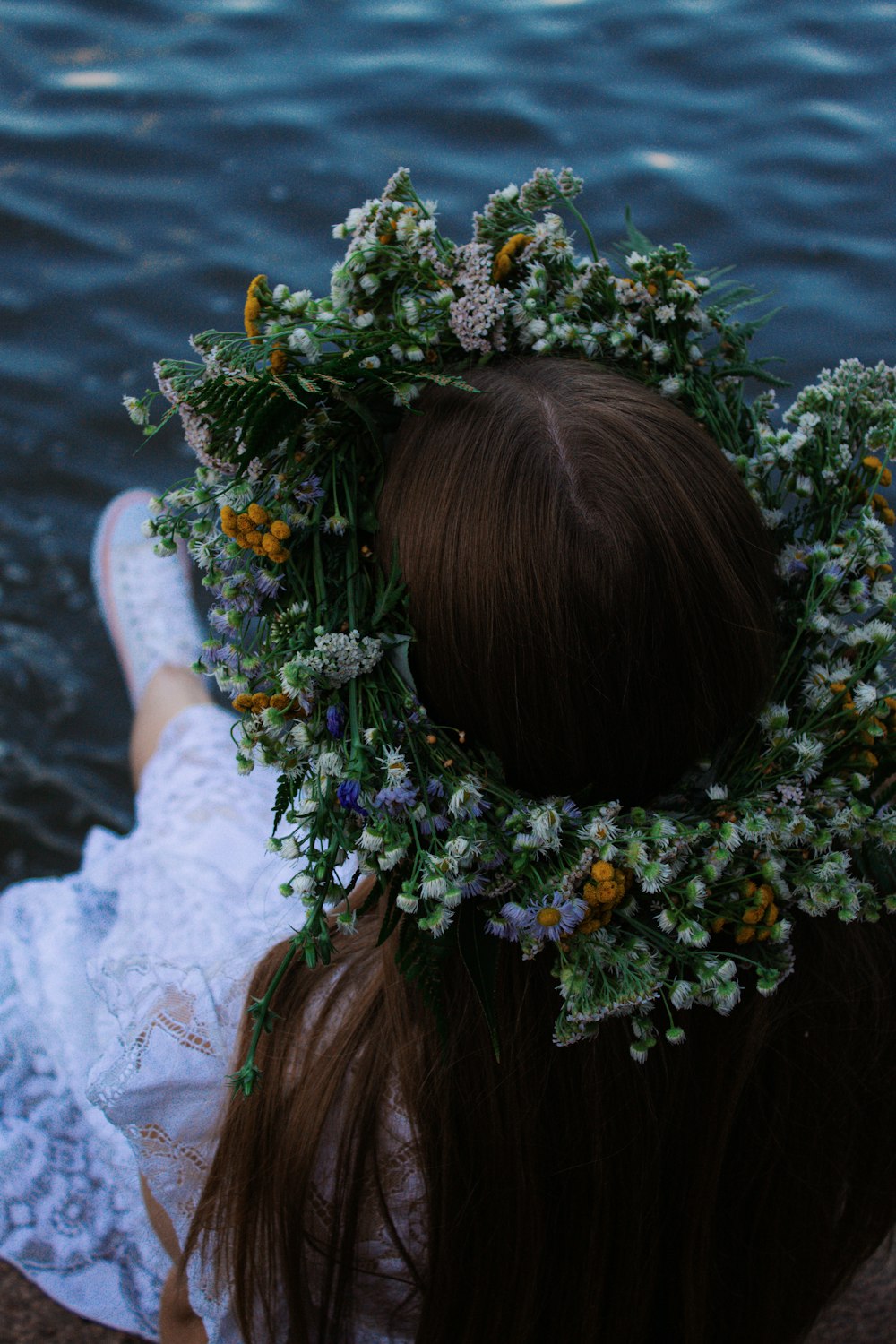 a couple of people holding flowers