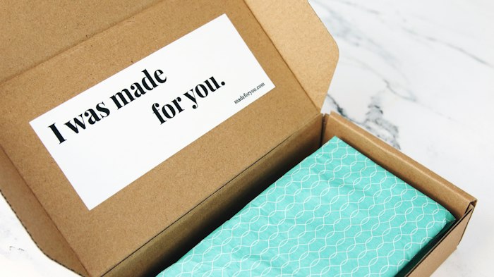 Shipping box with a message card and packaging