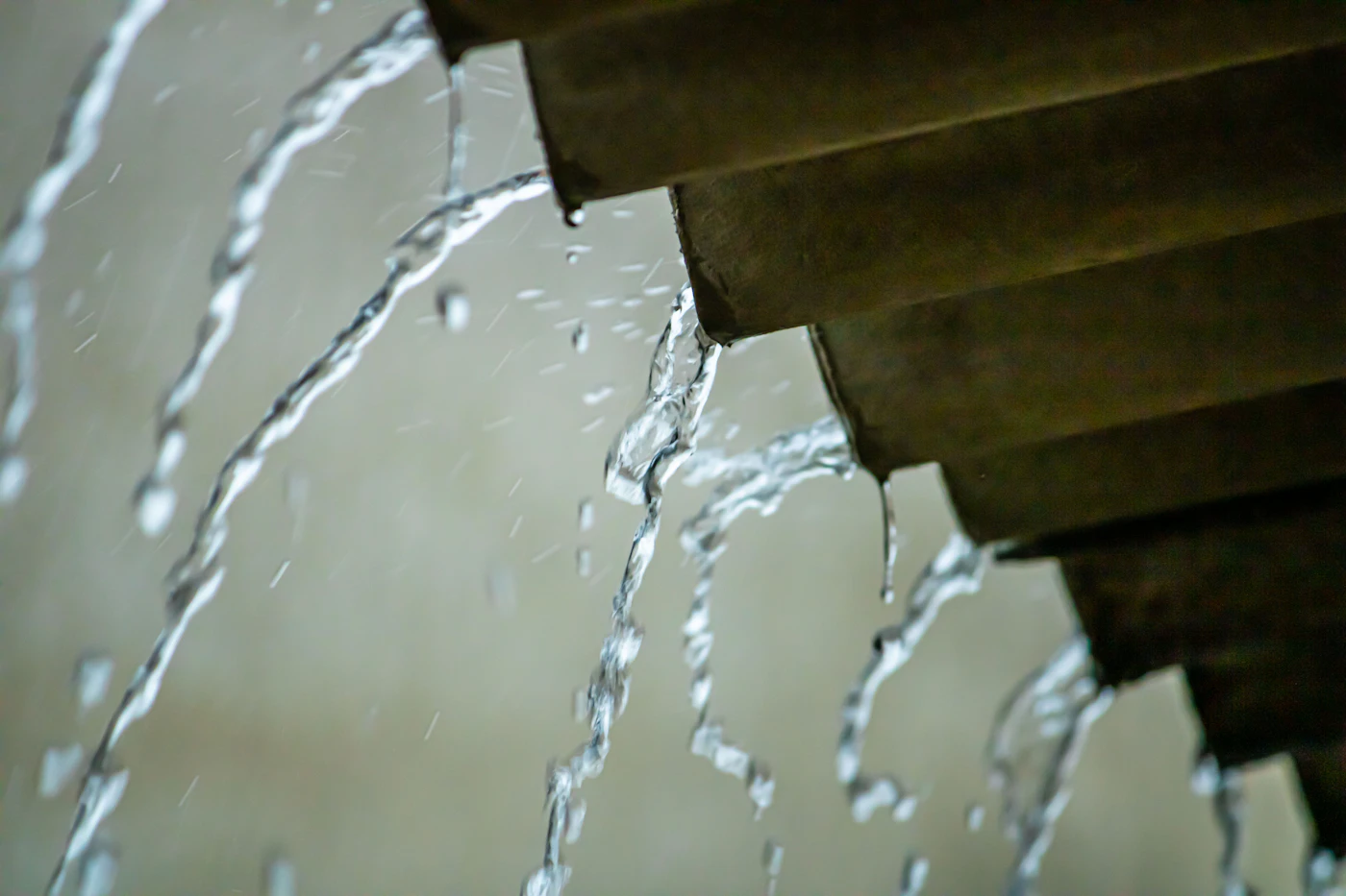 Water pouring from a failed pipe, a common source of Florida home water damage