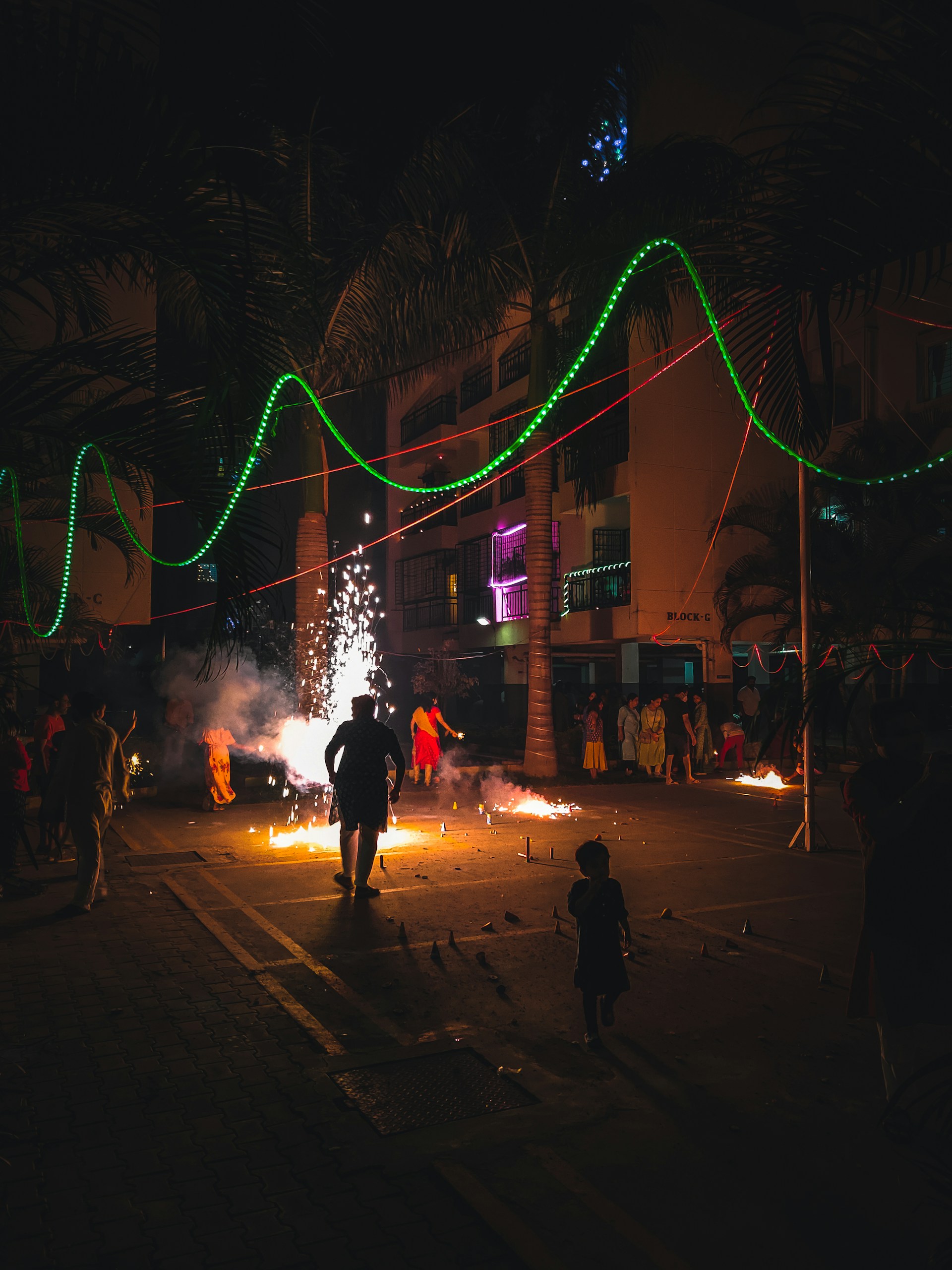 woman wearing yellow long-sleeved dress under white clouds and blue sky during daytime