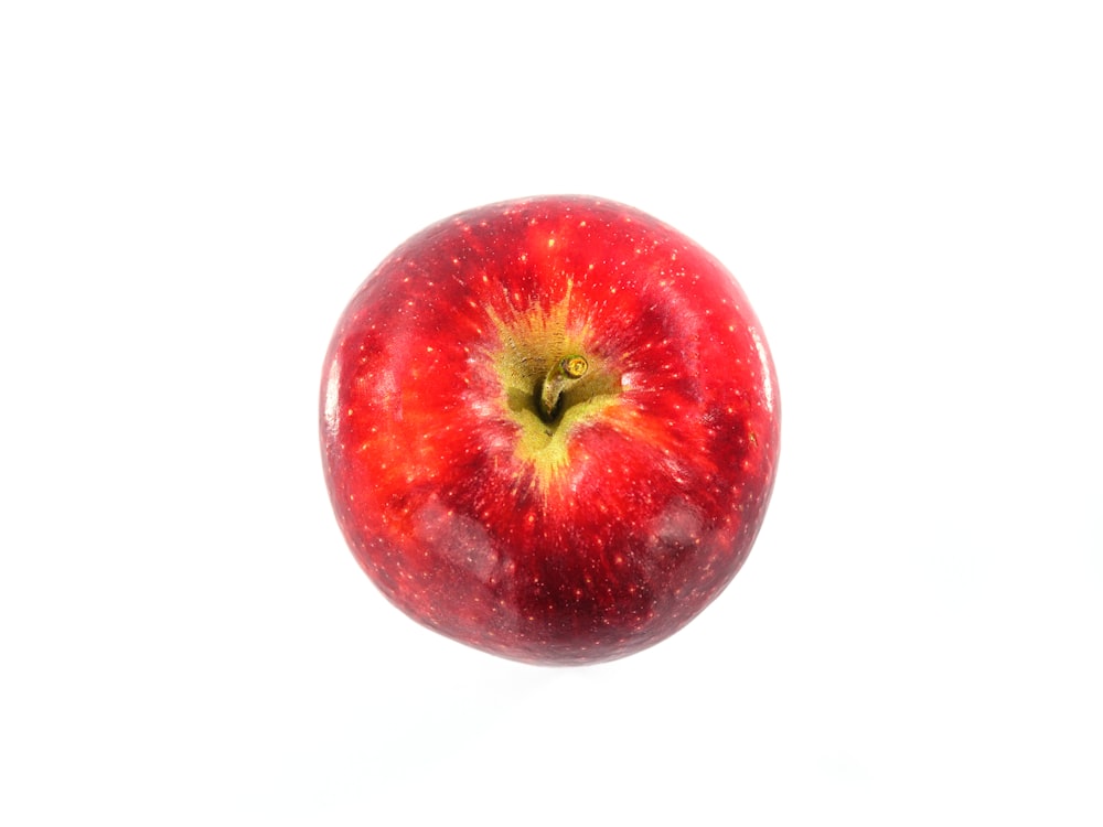 une pomme rouge avec une tige