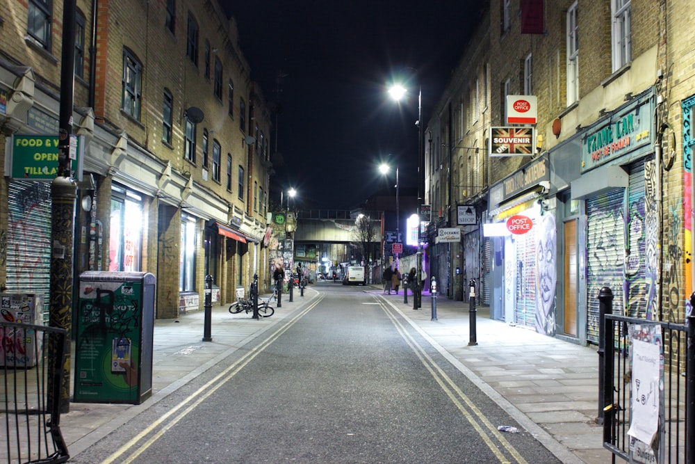 a street with buildings and people