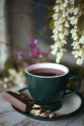 a cup of coffee on a saucer