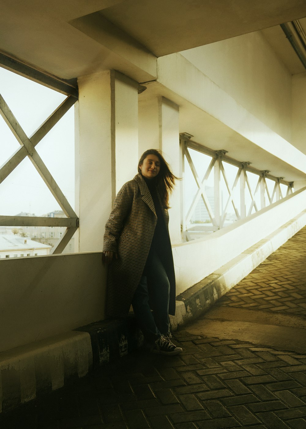 a woman standing on a staircase