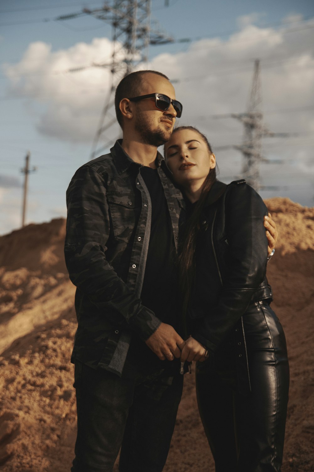 a man and woman posing for a picture