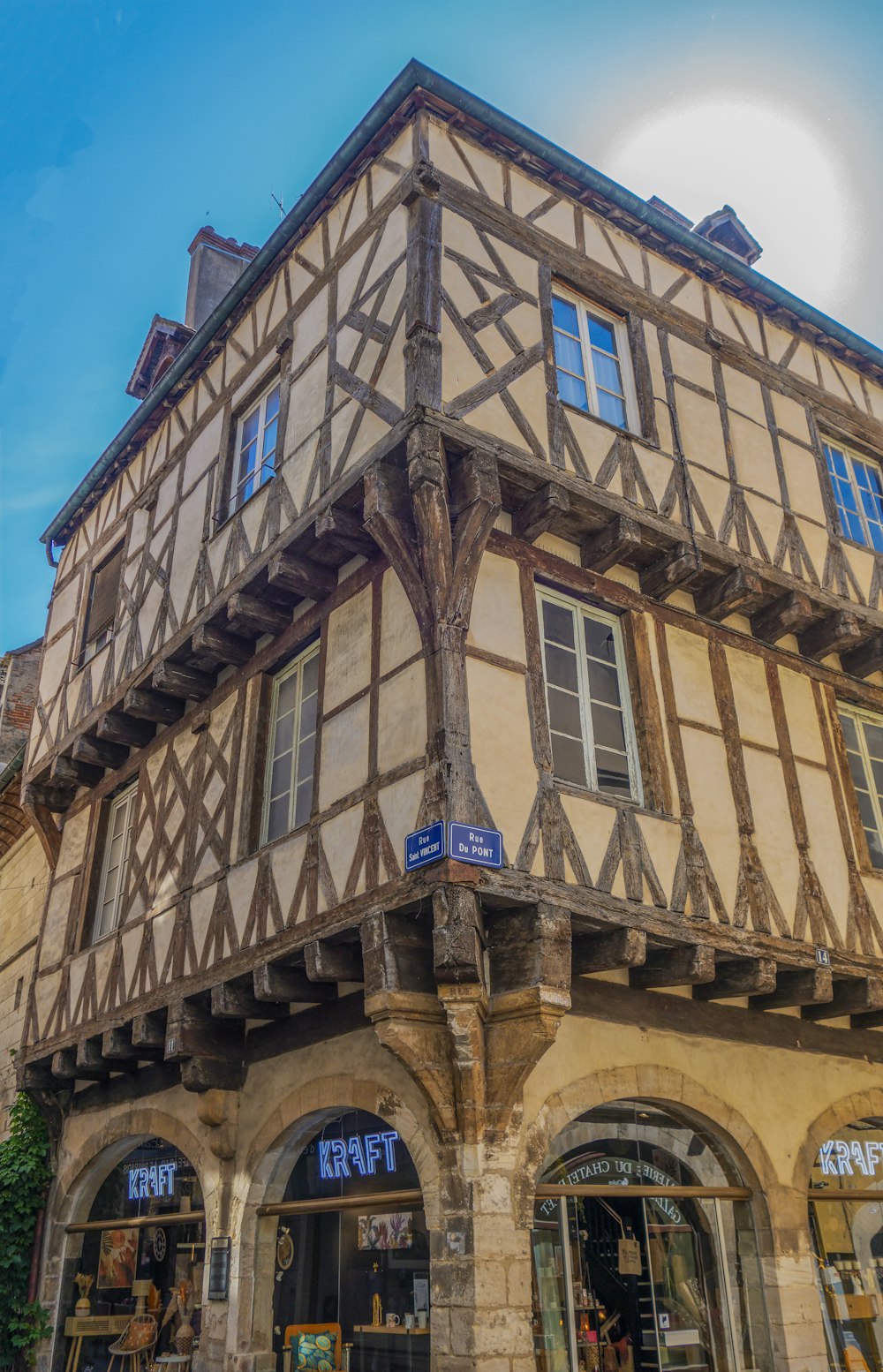 a building with windows and a blue sky