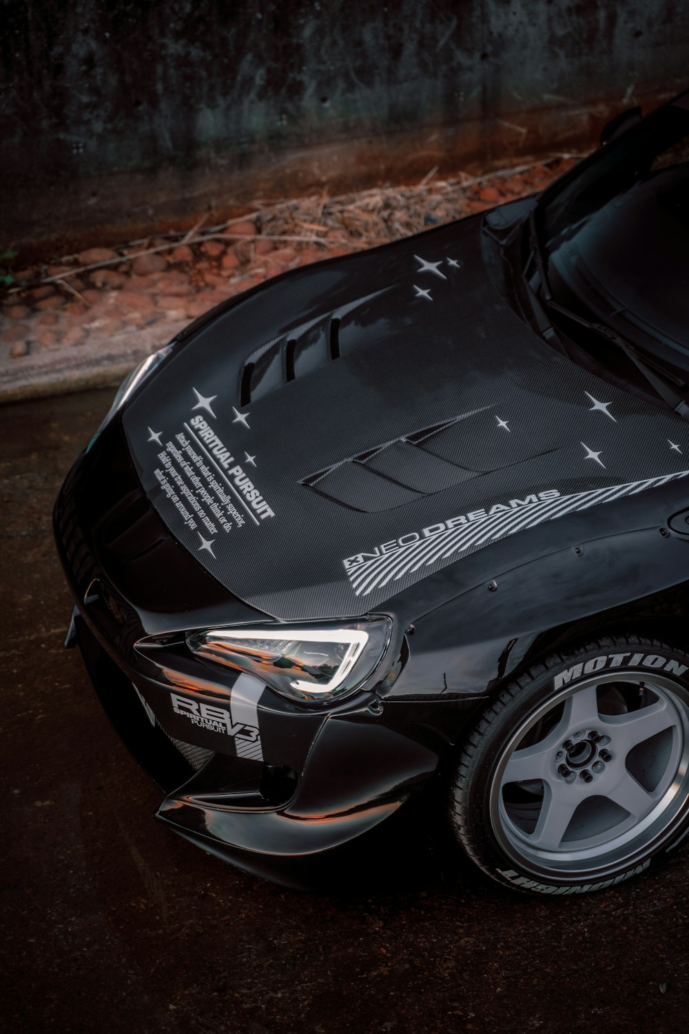 a black car with a logo