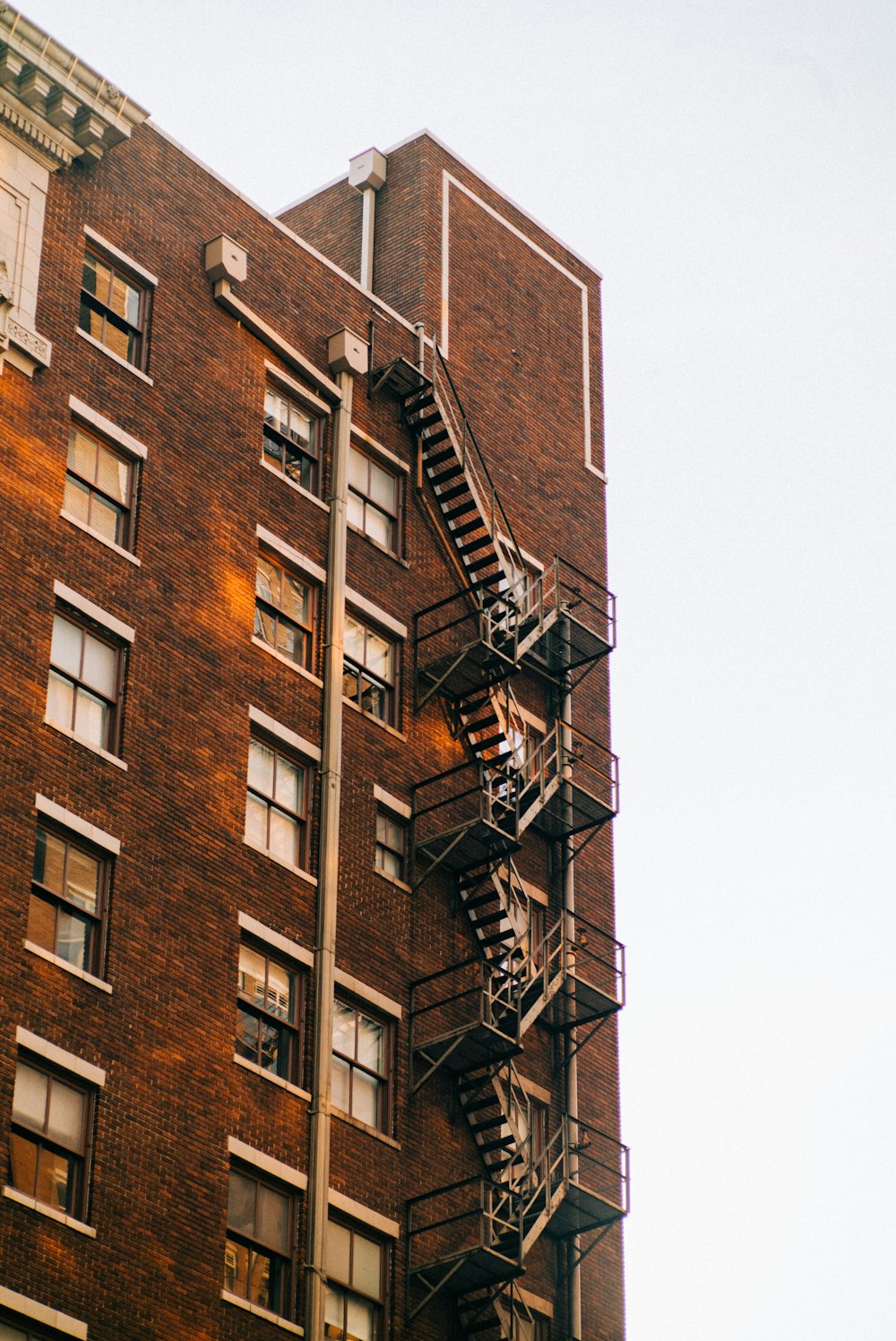 a tall building with ladders