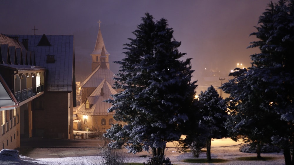 a church with a steeple at night