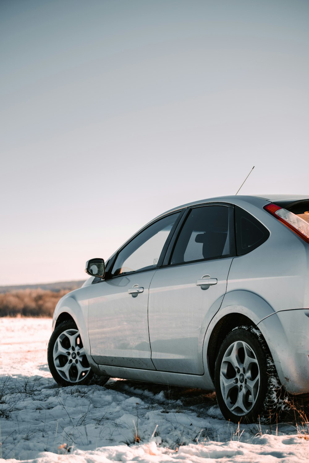 a car parked in the snow