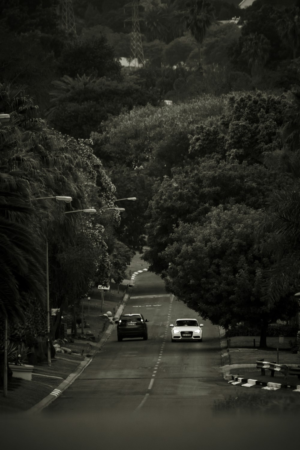 cars driving down a road