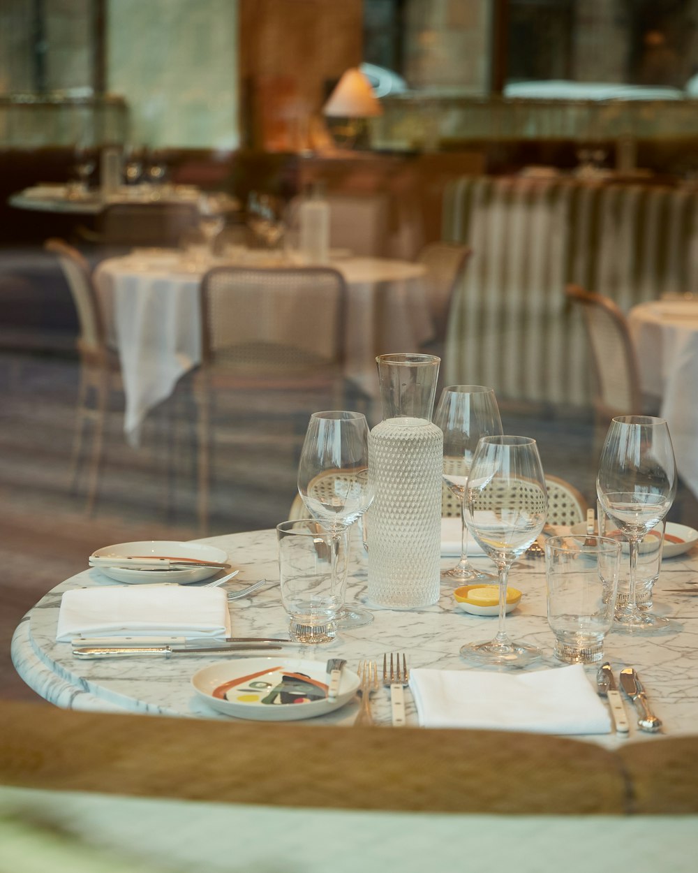 a table with empty glasses