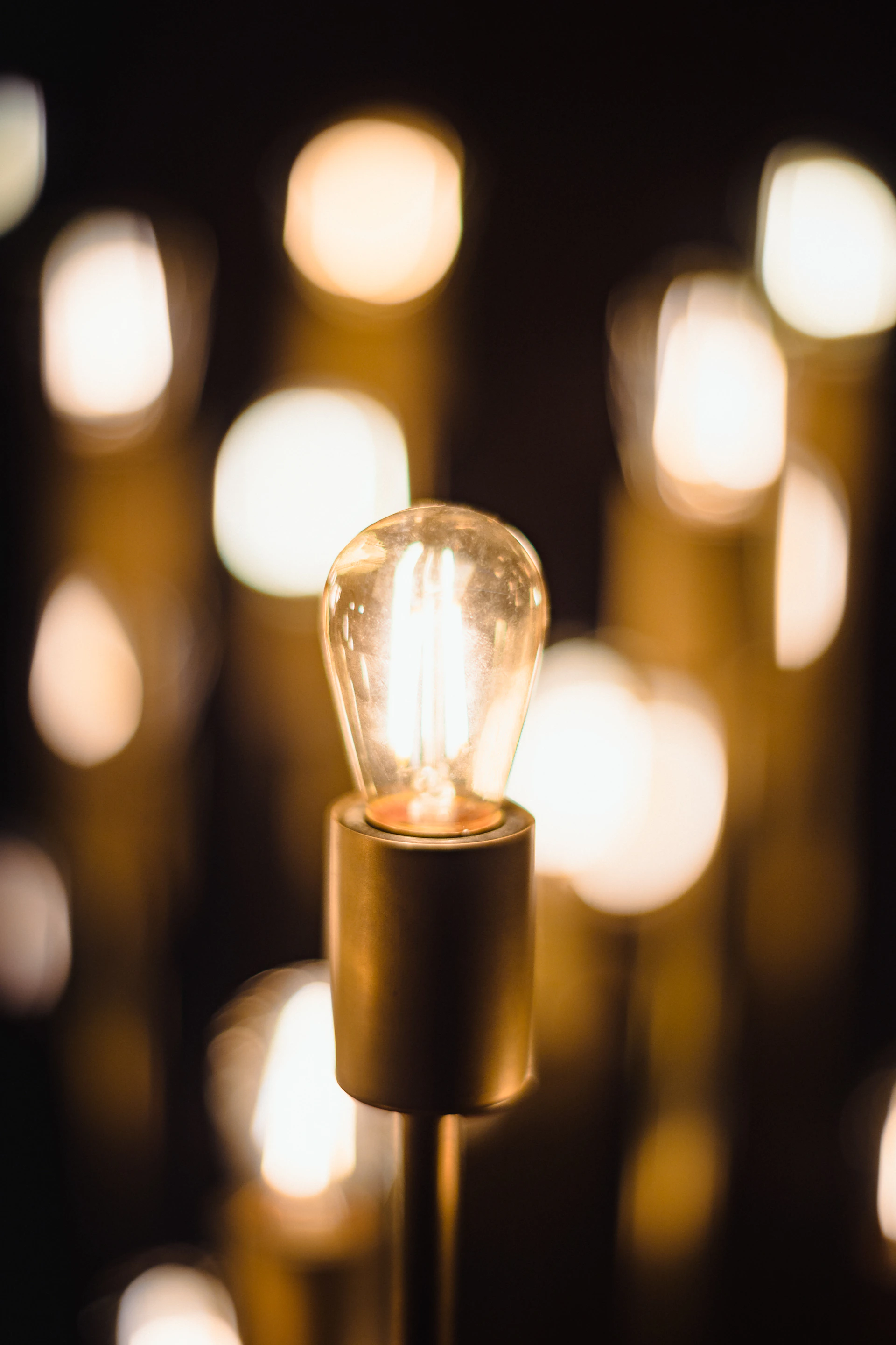a light bulb with a flame