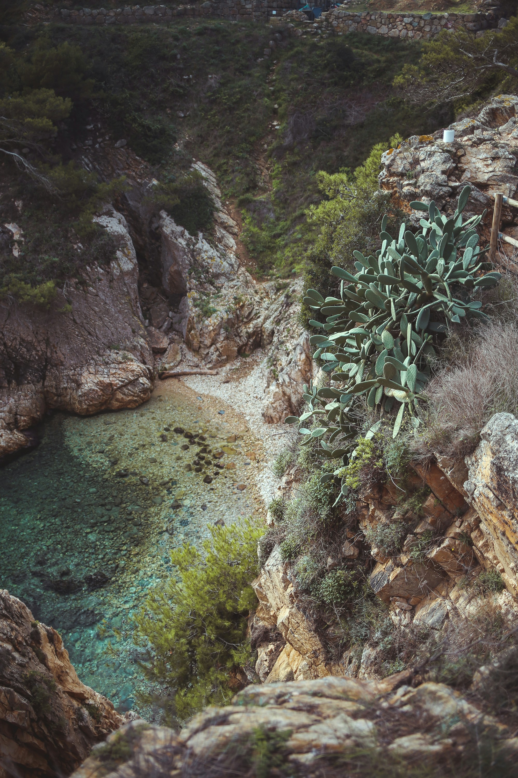 a small waterfall in a rocky area