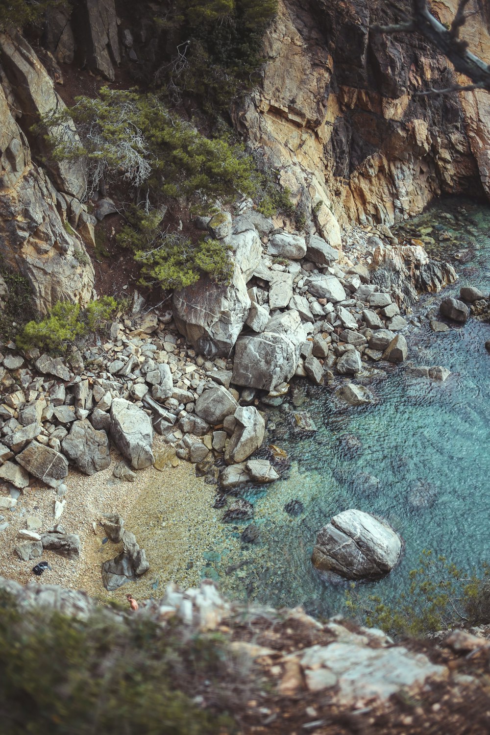 a rocky area with a river running through it