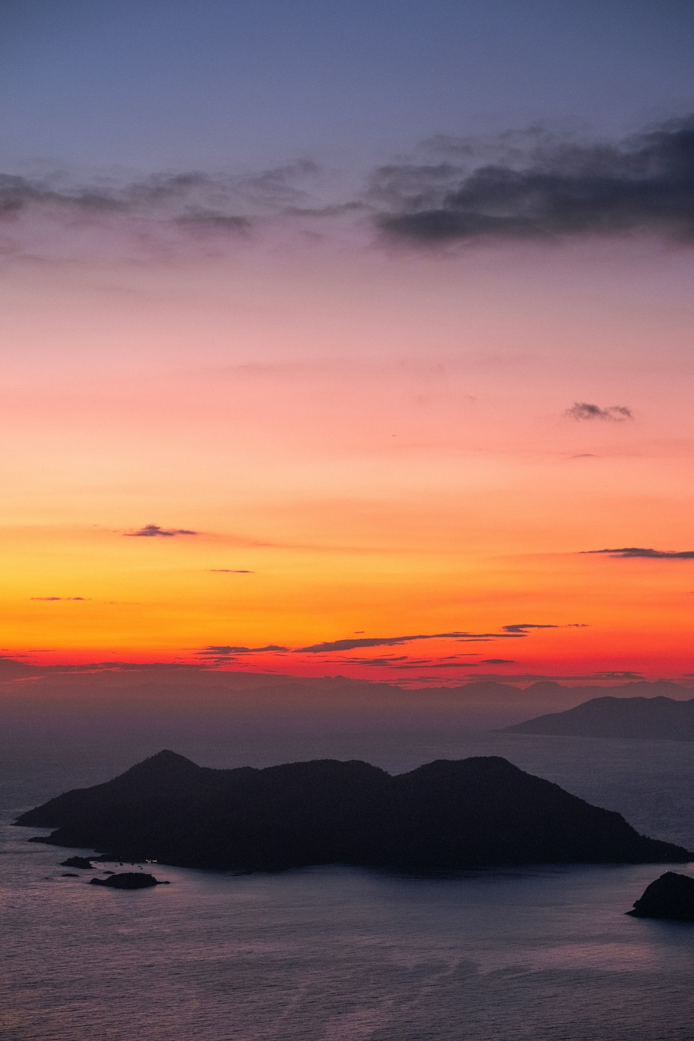 a sunset over a body of water