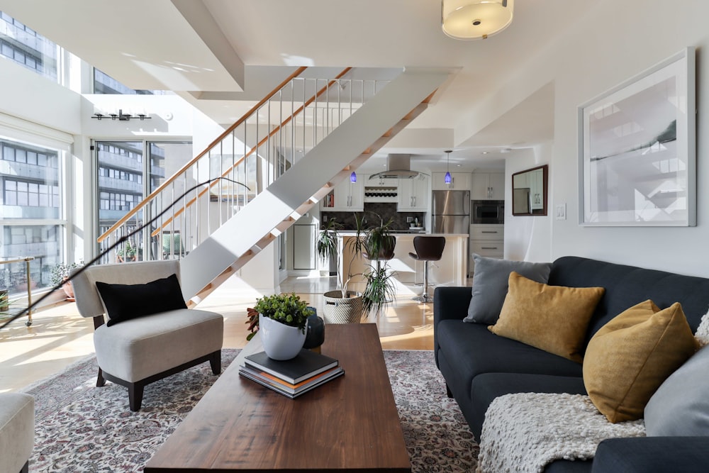 a living room with a staircase