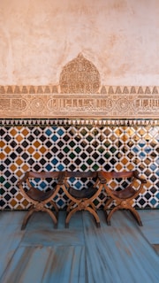 a group of Andalusian wooden chairs